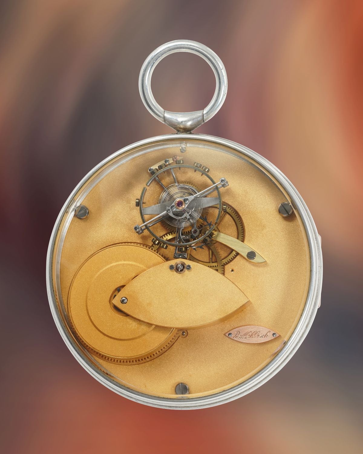 Lot 61: A circa 1985 Richard Miklosch flying tourbillon pocket watch with detent escapement in silver, included in The Geneva Watch Auction XXIV. Estimate: CHF 300,000–600,000