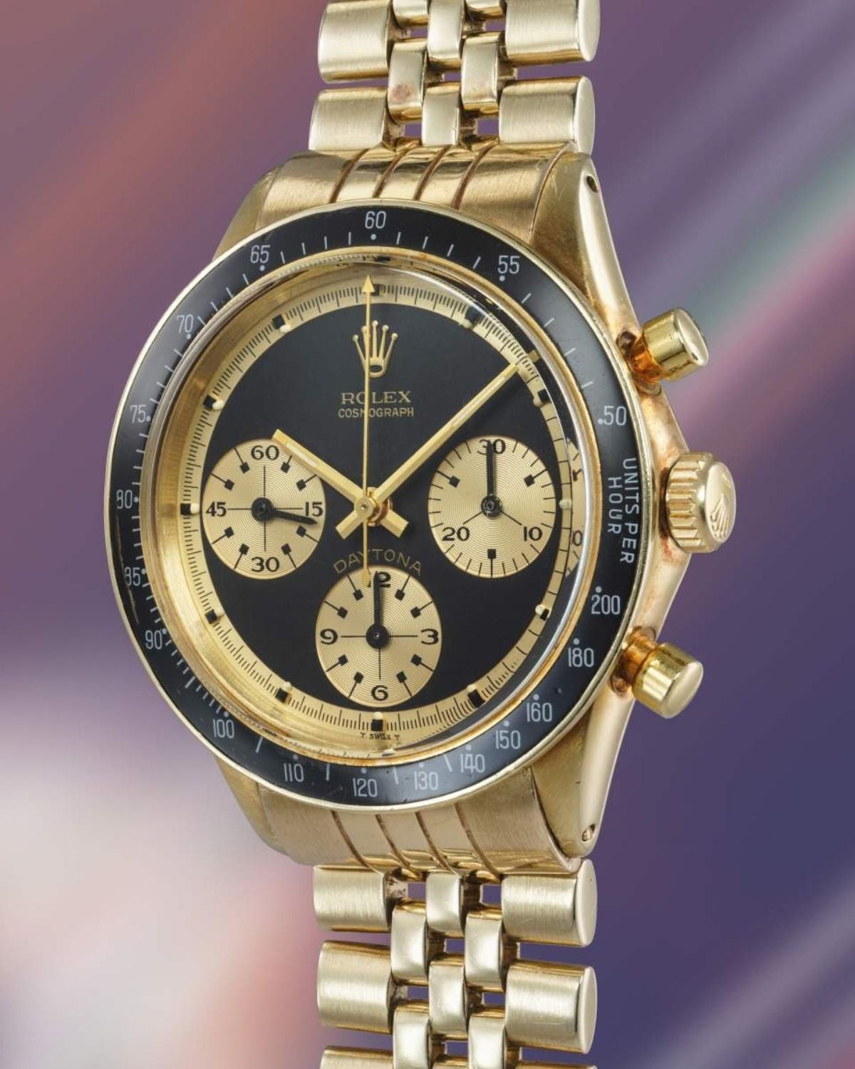 Lot 20: A circa 1969 Rolex Cosmograph Daytona Ref. 6241 “John Player Special” in 14k yellow gold with a black Paul Newman dial, included in The Geneva Watch Auction XXIV. Estimate: CHF 800,000–1,600,000