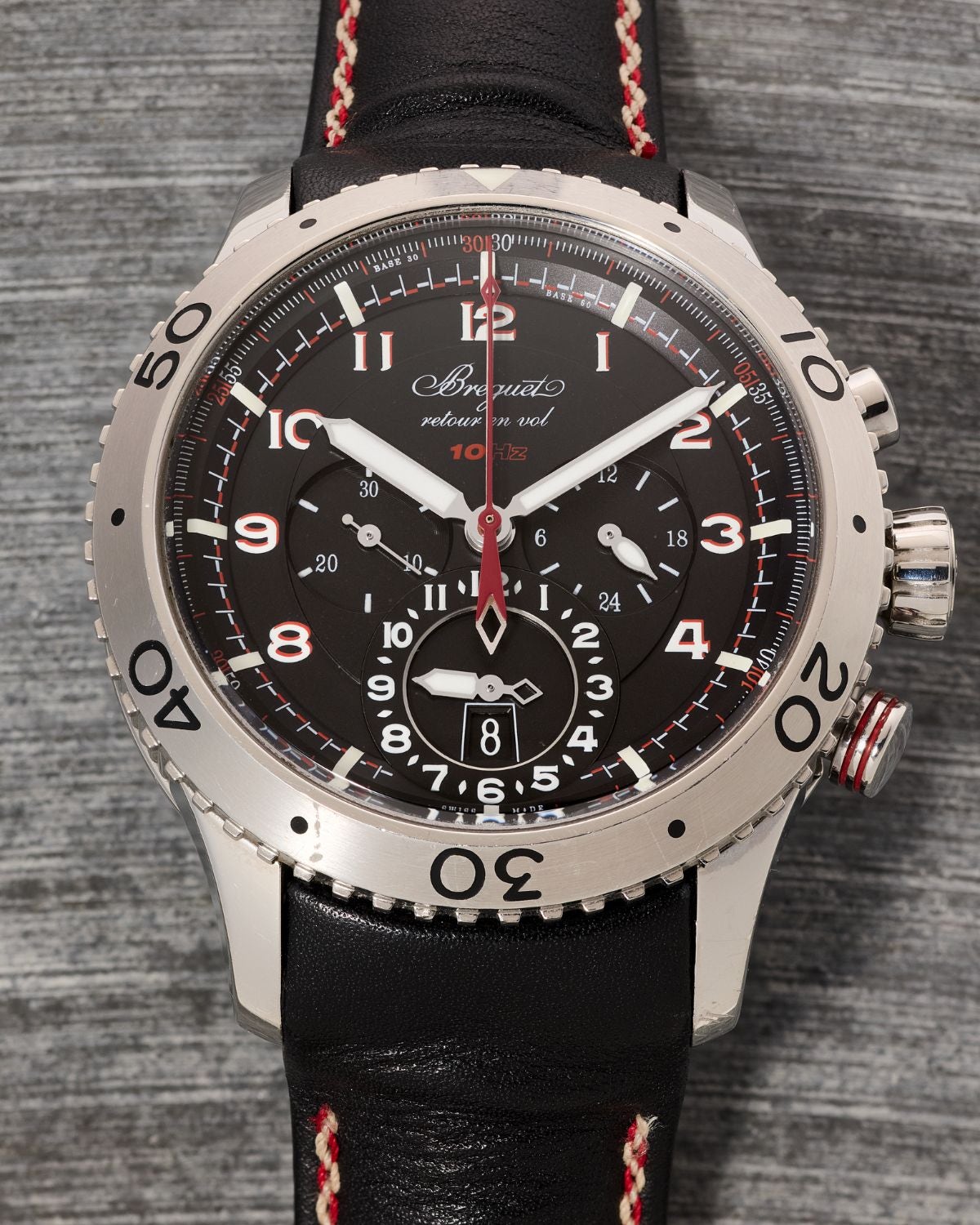 Lot 41: A circa 2012 Breguet Type XXII Retour en Vol 10 Hz Ref. 3880ST in stainless steel, included in the Phillips New York Sessions, Fall 2026. Estimate: USD $4,000–8,000
