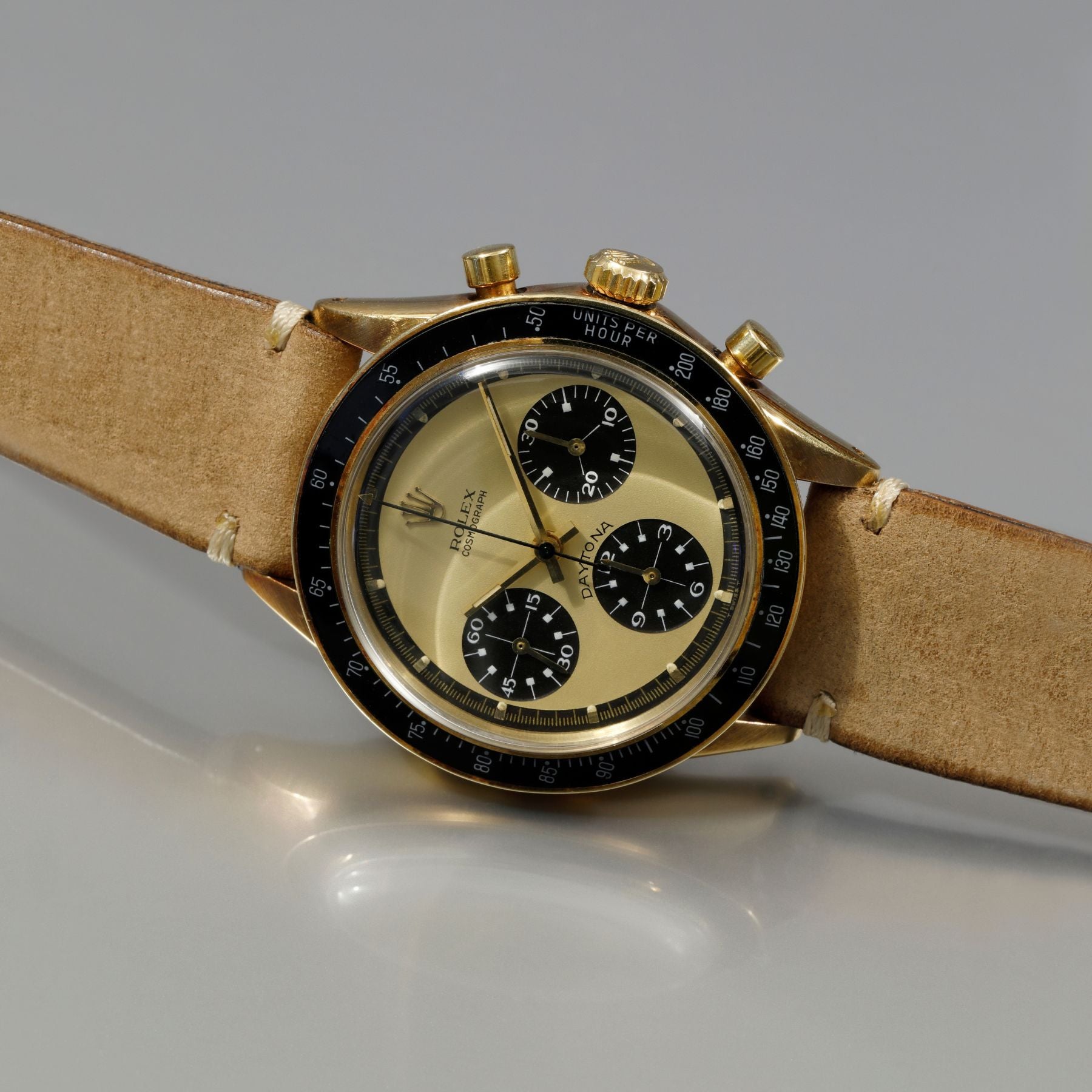 Lot 131: A circa 1970 Rolex Cosmograph Daytona Ref. 6264 “Paul Newman Lemon” in 14k yellow gold, included in The Geneva Watch Auction XXIV. Estimate: CHF 1,000,000–2,000,000. Photo: Archivo Pucci Papaleo