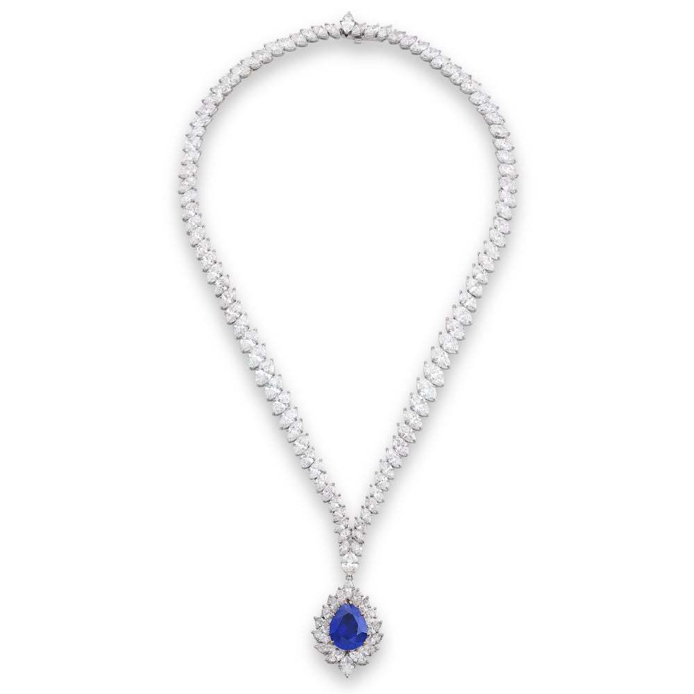Harry Winston, Sapphire and diamond pendent necklace. Sapphire weighing 9.28 carats, Ceylon origin, no indications of heating. 