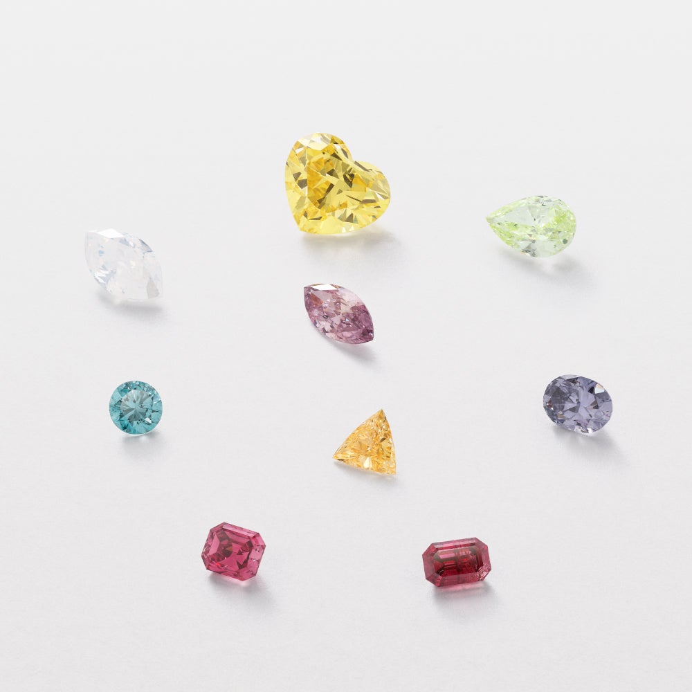 Collection of nine Fancy colour diamonds.