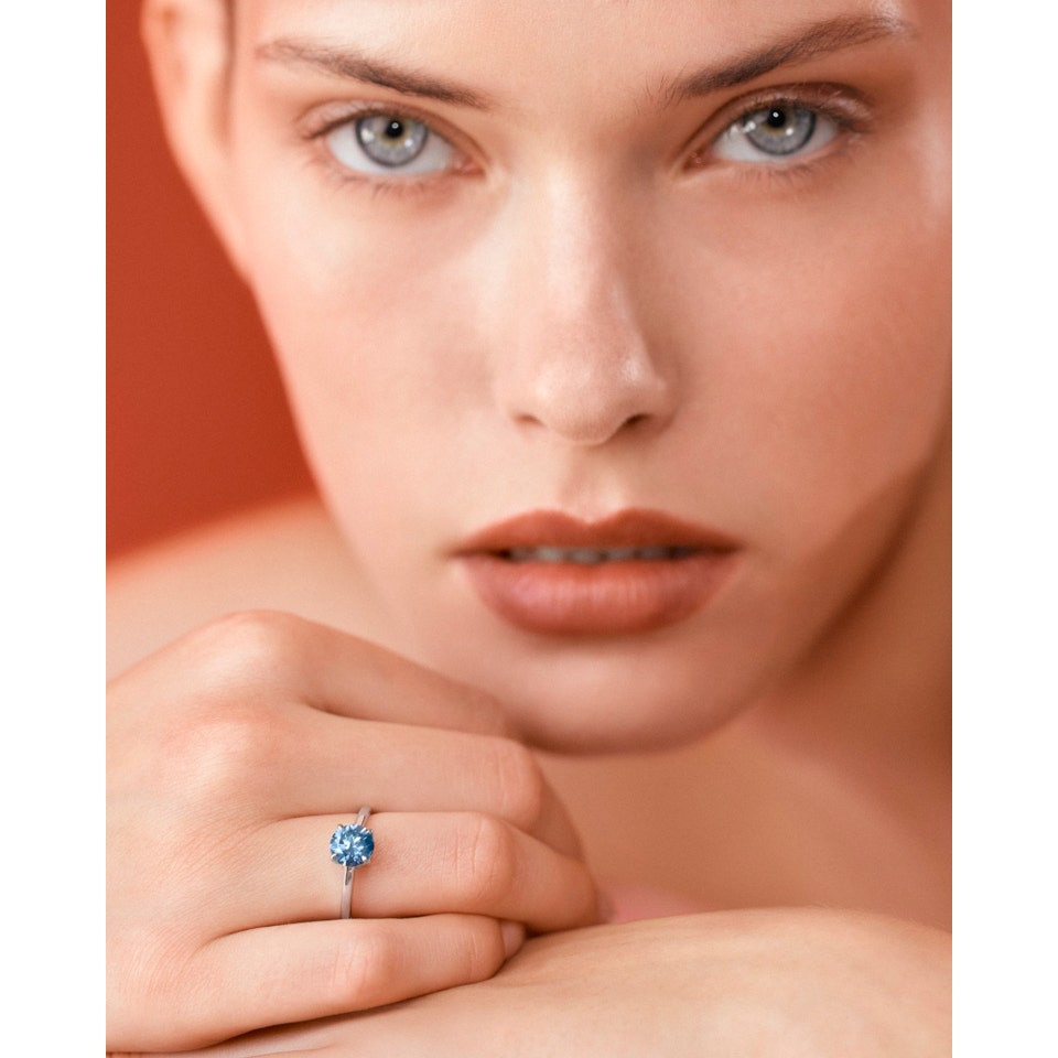 Exceptional Fancy Vivid Blue diamond ring. Brilliant-cut diamond weighing 1.35 carat, Natural Colour, VVS2 Clarity, Excellent Polish and Symmetry.