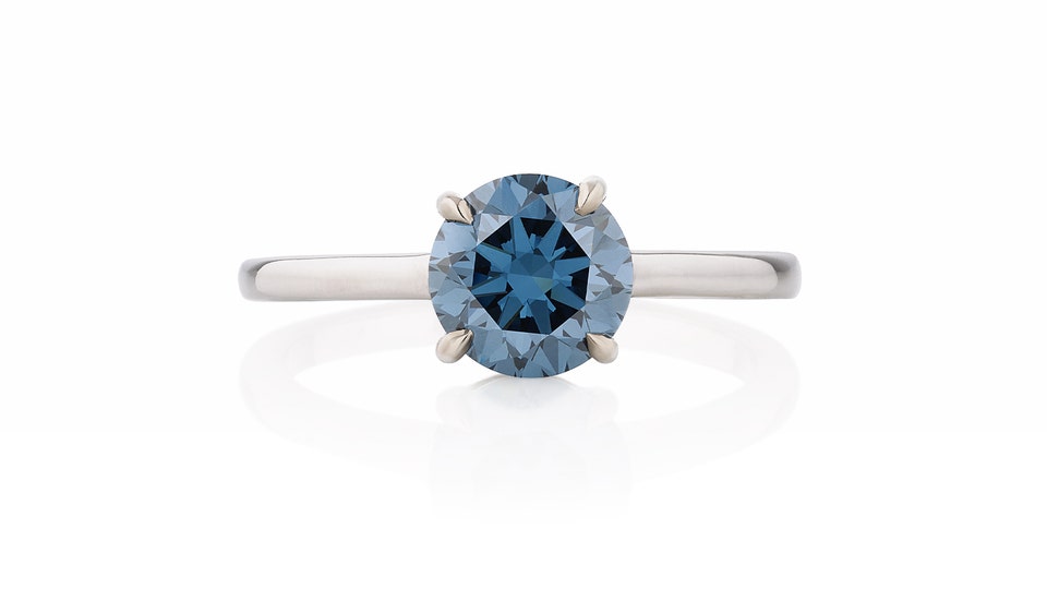Exceptional Fancy Vivid Blue diamond ring. Brilliant-cut diamond weighing 1.35 carat, Natural Colour, VVS2 Clarity, Excellent Polish and Symmetry.