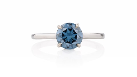 Exceptional Fancy Vivid Blue diamond ring. Brilliant-cut diamond weighing 1.35 carat, Natural Colour, VVS2 Clarity, Excellent Polish and Symmetry.